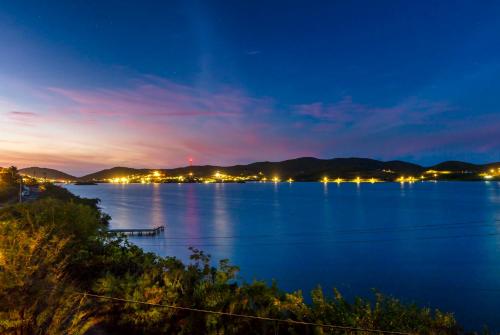 a view of a large body of water at night at Oceania Villas in Culebra
