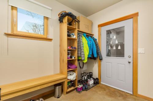 a walk in closet with a white door at The Mountain Project #2 in Rossland