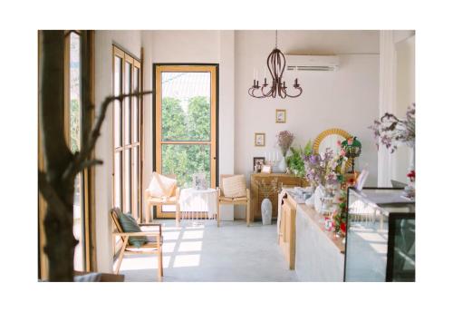 Χώρος καθιστικού στο White Wall Riverfront Hotel