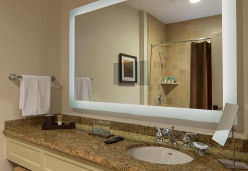 a bathroom with a sink and a mirror at Hyatt Regency Lake Tahoe Resort, Spa & Casino in Incline Village