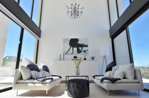Posezení v ubytování Exclusive Villa Campoamor by NRAS