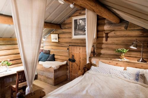 Кровать или кровати в номере Nutheim Gjestgiveri