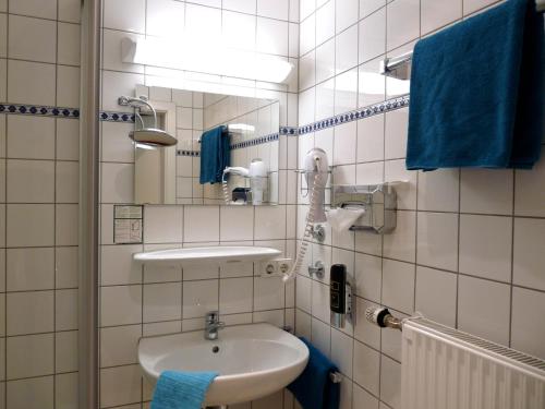 Koupelna v ubytování Hotel Geissler