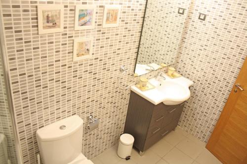 A bathroom at Beautiful seafront house