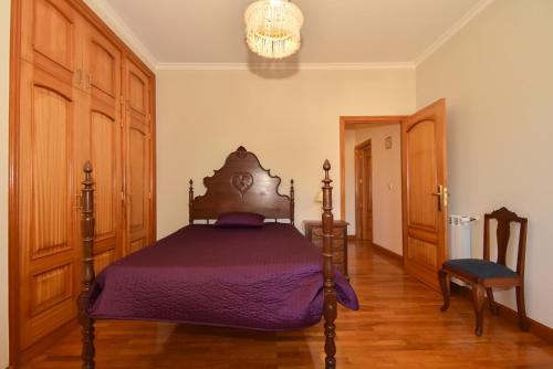 Ένα ή περισσότερα κρεβάτια σε δωμάτιο στο O REFUGIO