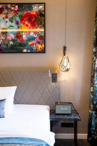 Ένα ή περισσότερα κρεβάτια σε δωμάτιο στο Boutique Hotel Poppenbütteler Hof