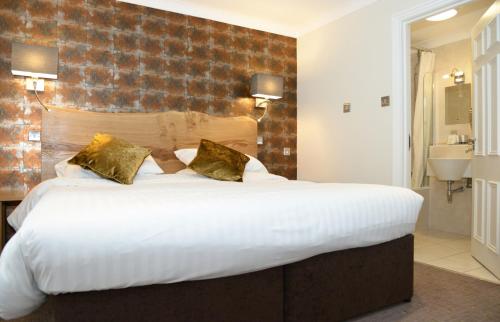 Katil atau katil-katil dalam bilik di The Waterloo Hotel