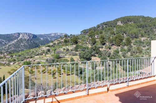 a balcony with a view of a mountain at Can Cega in Bunyola