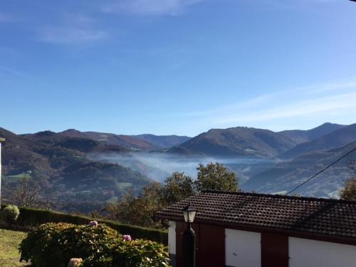 a house with a view of the mountains at Casa Katton in Etxalar