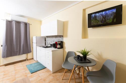 Η κουζίνα ή μικρή κουζίνα στο Seven Heaven Premium Suites