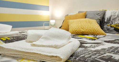 Un ou plusieurs lits dans un hébergement de l'établissement Annetta home
