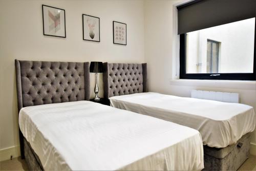 Katil atau katil-katil dalam bilik di The Hubert - Your Apartment