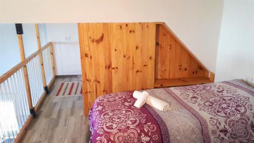 Ένα ή περισσότερα κρεβάτια σε δωμάτιο στο Apartament in arico