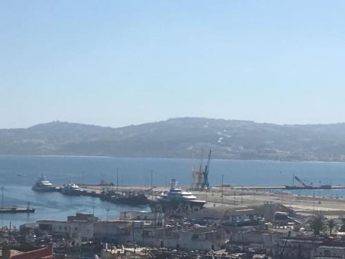a view of a harbor with boats in the water at Dar 23 in Tangier