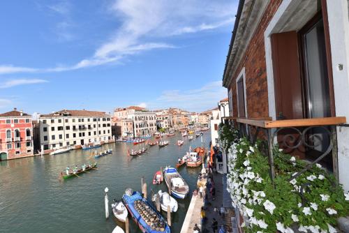 a view of a canal with boats in the water at B&b Vista sul Canal Grande in Venice