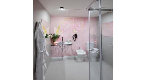 Koupelna v ubytování Hotel Galería Essentia