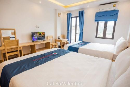 Ένα ή περισσότερα κρεβάτια σε δωμάτιο στο CatBa Valentine Homestay