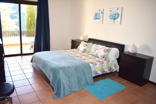 Posteľ alebo postele v izbe v ubytovaní El Casar Apartments