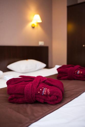 Katil atau katil-katil dalam bilik di Romantik Spa Hotel
