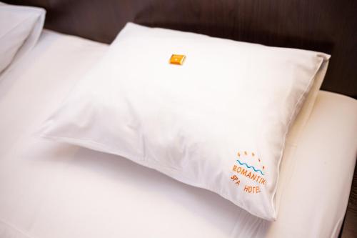 Katil atau katil-katil dalam bilik di Romantik Spa Hotel