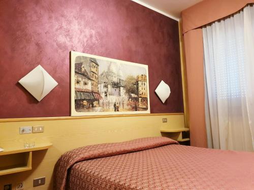 Una cama o camas en una habitación de HOTEL PARADISO