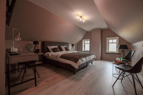 Postel nebo postele na pokoji v ubytování B&B De Waeterhoeve