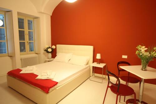 Кровать или кровати в номере Verbania - Luxury Italy Apartments