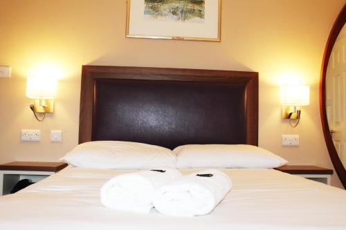 Postel nebo postele na pokoji v ubytování St. Judes Lodge B&B