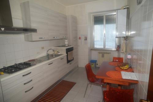 Kuchyň nebo kuchyňský kout v ubytování Casa Graziella