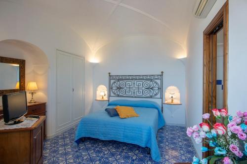 A bed or beds in a room at Villamena