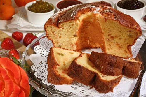 a loaf of bread on a plate on a table at Amalia Cascina in Langa in Monforte dʼAlba