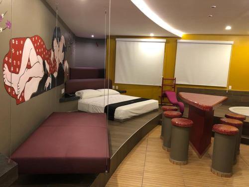 Tempat tidur susun dalam kamar di Motel Tatami