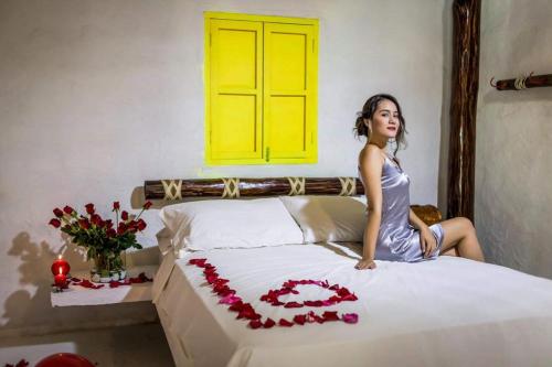 Ένα ή περισσότερα κρεβάτια σε δωμάτιο στο Hotel Boutique Yararaka