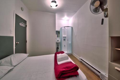 Hotel Mini Incにあるベッド