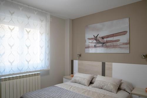 Posteľ alebo postele v izbe v ubytovaní Alojamiento Turistico La Casa del tio Cesar