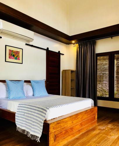 Katil atau katil-katil dalam bilik di The Village Siargao