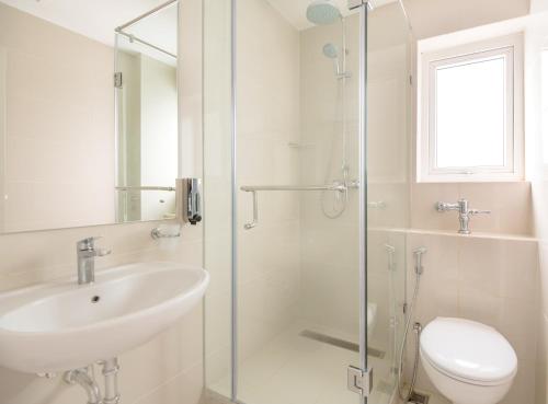 Ванная комната в Fairway Sunset Serviced Apartments