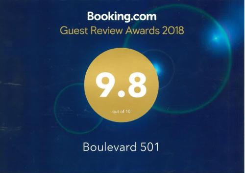 a sign that says guest review awards with a yellow circle at Boulevard 501 in Margate