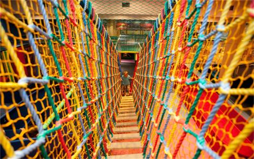 a hallway filled with lots of colored nets at Mangrove Tree Resort World Sanya Bay-Kapok in Sanya