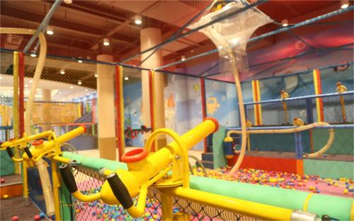 a play area with a slide in a playground at Mangrove Tree Resort World Sanya Bay-Kapok in Sanya