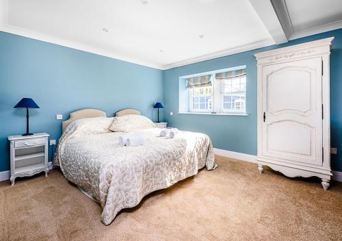 Un pat sau paturi într-o cameră la Sherbourne House