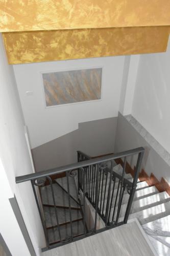 a view from the top of a staircase with a ceiling at Albano Station Rooms in Pavona
