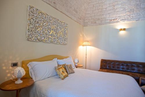 Ein Bett oder Betten in einem Zimmer der Unterkunft Perlage Suite Luxury B&B - Amazing view of Trulli