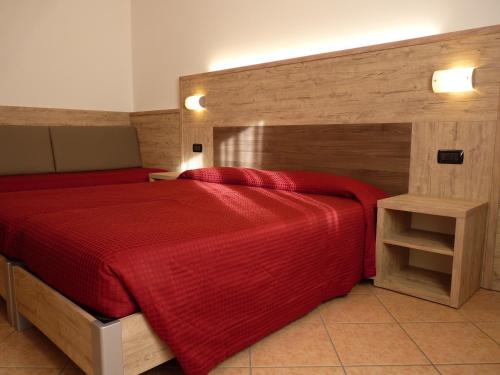 Katil atau katil-katil dalam bilik di Residence Alba Nova
