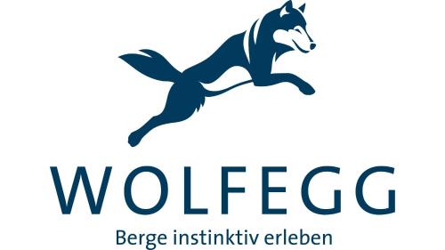 a logo for wolfge electricity edmonton with the words bicycle infrastructure edmonton at Wolfegg in Warth am Arlberg