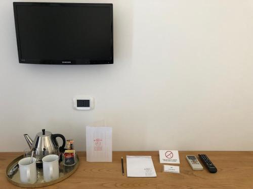 Da Baranin B&B and Apartmentにあるテレビまたはエンターテインメントセンター