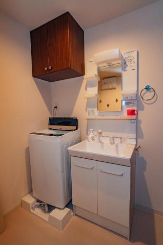 Η κουζίνα ή μικρή κουζίνα στο Ben's Guesthouse Kyoto