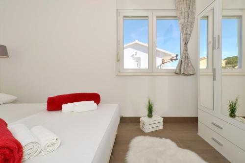 Posteľ alebo postele v izbe v ubytovaní Stunning View Apartment with pool