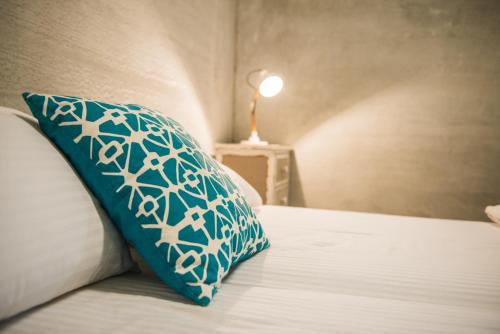 Postel nebo postele na pokoji v ubytování Mao House