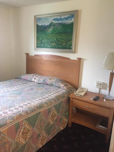 Postel nebo postele na pokoji v ubytování Motel express